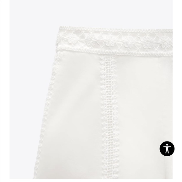 High waisted shorts with tonal crochet appliqué. Side hidden inseam zip closure - Picture 8 of 11
